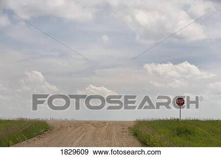 A dirt road and stop sign View Large Photo Image Stock Photo - A dirt road and stop sign. Fotosearch