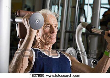 Stock Image - A senior man working out. Fotosearch