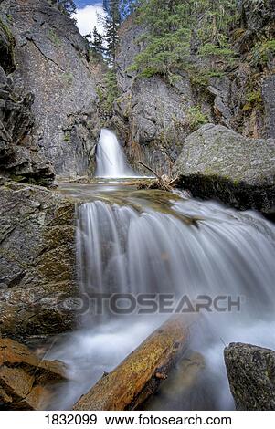 Stock Photo - A Waterfall In Kananaskis. Fotosearch