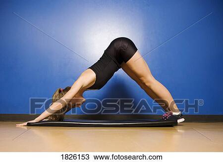A woman bending View Large Photo Image Stock Image - A woman bending. Fotosearch