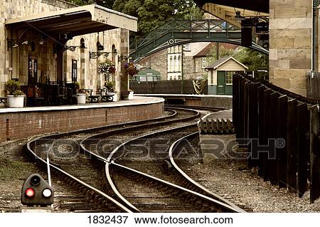An Old-Fashioned Train Station And Tracks View Large Photo Image Stock Photo - An Old-Fashioned Train Station And Tracks. Fotosearch