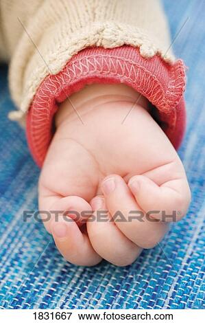 Stock Photo - Baby hand. Fotosearch
