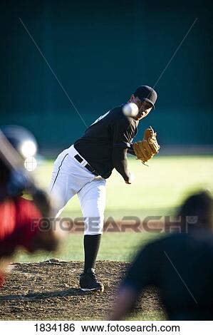 Baseball pitcher throwing View Large Photo Image Stock Photograph - Baseball pitcher throwing. Fotosearch
