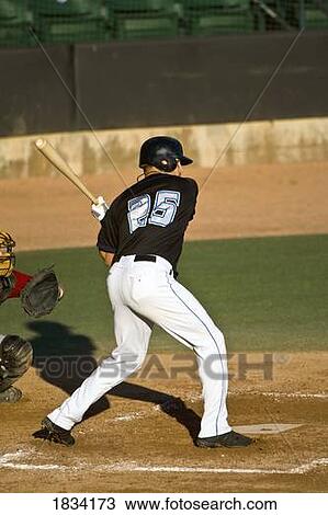 Stock Image - Baseball player at bat. Fotosearch