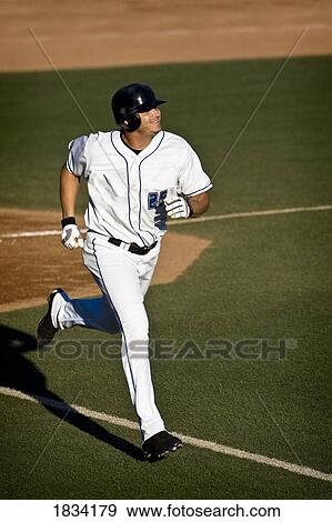 Stock Photo - Baseball player running. Fotosearch