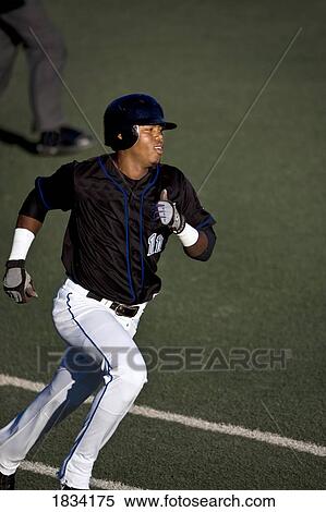 Baseball player running View Large Photo Image Stock Photography - Baseball player running. Fotosearch