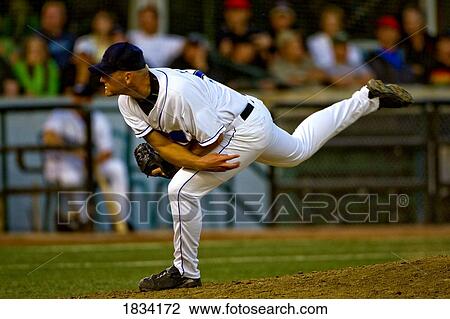 Baseball player throwing the ball View Large Photo Image Stock Image - Baseball player throwing the ball. Fotosearch