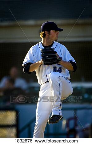 Baseball player winding up to pitch View Large Photo Image Stock Photograph - Baseball player winding up to pitch. Fotosearch