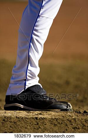 Stock Photo - Baseball player's foot. Fotosearch