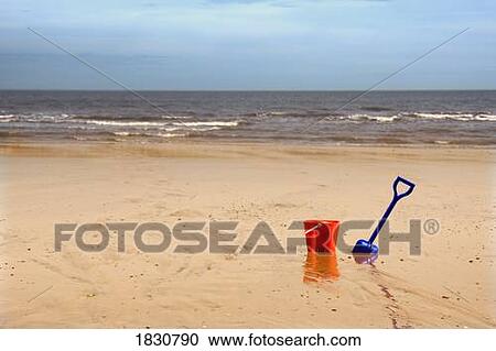 Beach pail and shovel, Humberside, England View Large Photo Image Stock Image - Beach pail and shovel, Humberside, England. Fotosearch