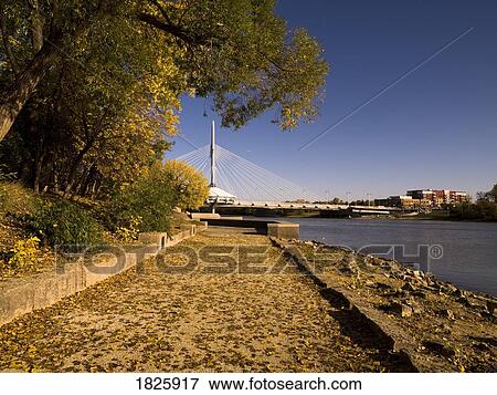 Beach with Forks bridge in background, Winnipeg, Manitoba, Canada View Large Photo Image Stock Photo - Beach with Forks bridge in background, Winnipeg, Manitoba, Canada. Fotosearch