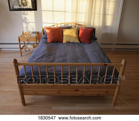 Stock Photo - Bed with pillows. Fotosearch