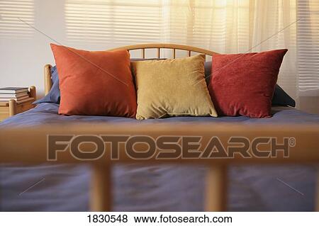 Bed with pillows View Large Photo Image Stock Photo - Bed with pillows. Fotosearch