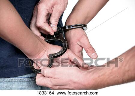 Picture - Being handcuffed. Fotosearch