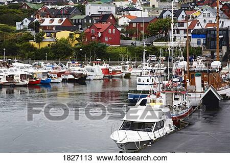 Stock Image - Boats in Torshavn, Faroe Islands, Kingdom of Denmark . Fotosearch