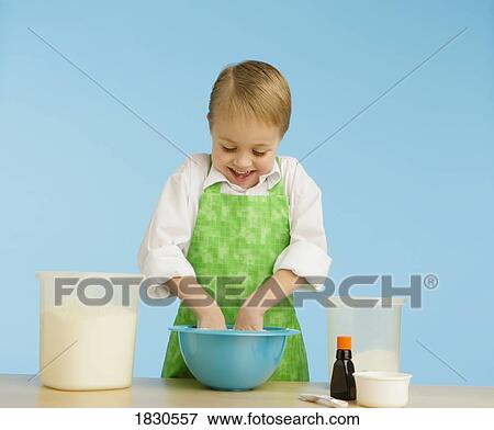 Boy baking View Large Photo Image Stock Photo - Boy baking. Fotosearch