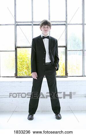 Boy dressed in tuxedo View Large Photo Image Stock Photograph - Boy dressed in tuxedo. Fotosearch