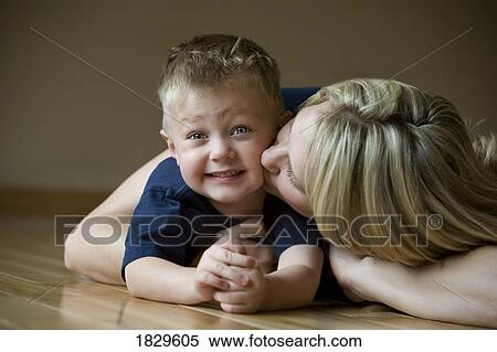 Boy with his mother View Large Photo Image Stock Photography - Boy with his mother. Fotosearch