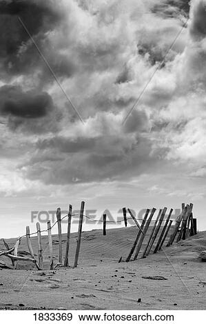 Broken fence in dune, South Shields, Tyne and Wear, England, Europe View Large Photo Image Stock Photo - Broken fence in dune, South Shields, Tyne and Wear, England, Europe . Fotosearch