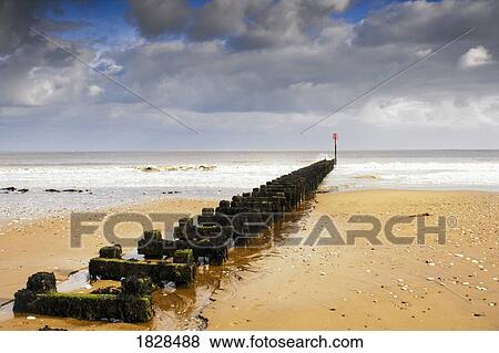 Stock Photo - Broken pier out to sea. Fotosearch