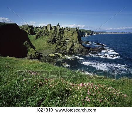 Stock Image - Buildings on a cliff overlooking the water. Fotosearch
