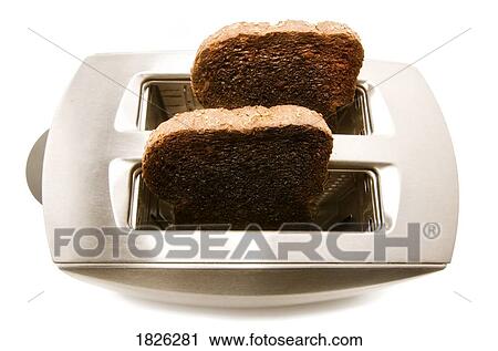Burnt toast popping out of a toaster View Large Photo Image Stock Image - Burnt toast popping out of a toaster. Fotosearch