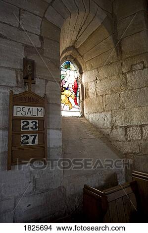 Picture - Church window, Holy Island, Bewick, England. Fotosearch