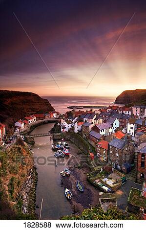 Cityscape at sunset, Staithes, Yorkshire, England View Large Photo Image Stock Photo - Cityscape at sunset, Staithes, Yorkshire, England. Fotosearch