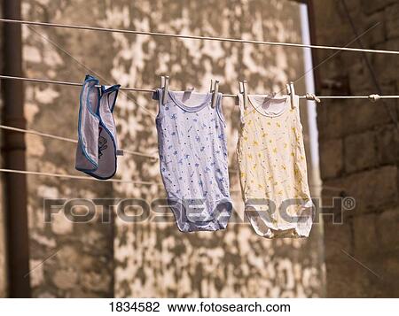 Stock Image - Clothes on a laundry line. Fotosearch