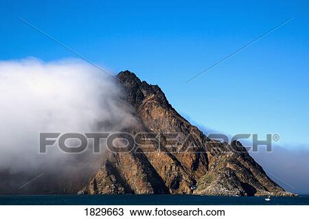 Cloud covering a mountain, Greenland View Large Photo Image Stock Image - Cloud covering a mountain, Greenland. Fotosearch