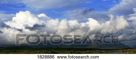 Stock Photograph - Clouds over 12 Bens in Connemara, N. Clifden, Co. Galway, Ireland, Europe. Fotosearch