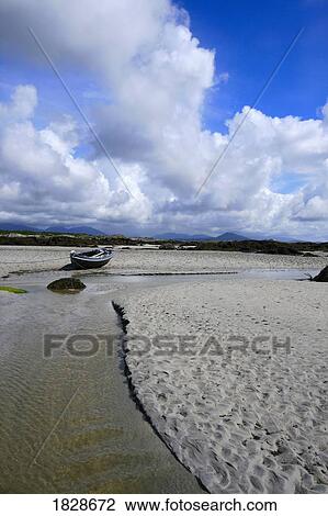 Stock Image - Connemara landscape with boat, County Galway, Ireland. Fotosearch