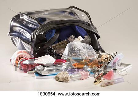 Contents of an overnight bag View Large Photo Image Picture - Contents of an overnight bag. Fotosearch