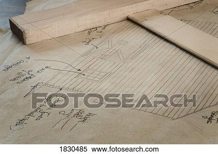Stock Photography - Drafting tools on a building sketch . Fotosearch