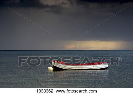 Empty boat floating in the North Sea, Sunderland, Tyne and Wear, England View Large Photo Image Stock Image - Empty boat floating in the North Sea, Sunderland, Tyne and Wear, England. Fotosearch