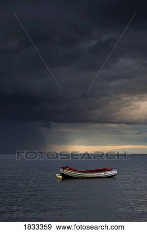 Empty boat floating in the North Sea, Sunderland, Tyne and Wear, England, Europe View Large Photo Image Stock Photo - Empty boat floating in the North Sea, Sunderland, Tyne and Wear, England, Europe . Fotosearch
