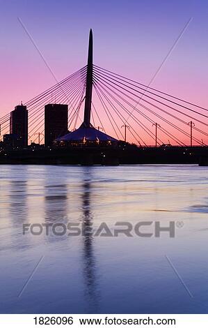 Stock Photograph - Esplanade Riel Bridge over the Red River, Winnipeg, Manitoba, Canada . Fotosearch