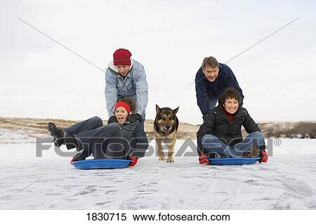 Family enjoying the winter View Large Photo Image Stock Photography - Family enjoying the winter. Fotosearch