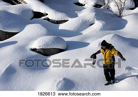 Stock Image - Female photographer, Jasper National Park, Alberta, Canada. Fotosearch
