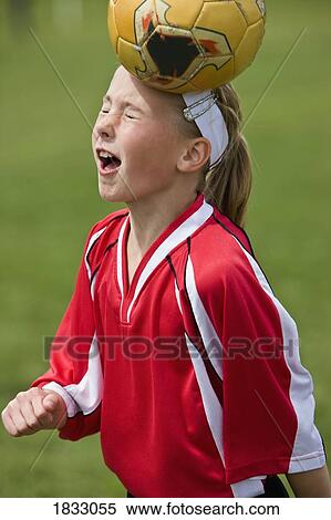 Female soccer player heading the ball View Large Photo Image Stock Photography - Female soccer player heading the ball . Fotosearch
