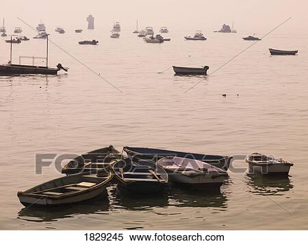 Stock Photography - Fishing boats at dawn. Fotosearch