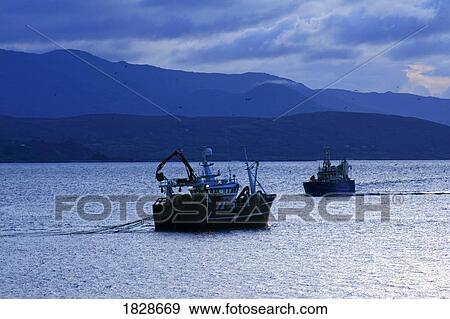 Fishing in Kenmare Bay, County Kerry, Ireland View Large Photo Image Stock Photo - Fishing in Kenmare Bay, County Kerry, Ireland. Fotosearch