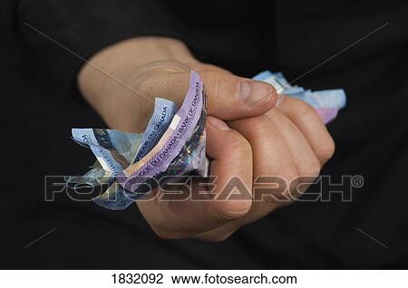 Fist full of cash View Large Photo Image Stock Image - Fist full of cash . Fotosearch