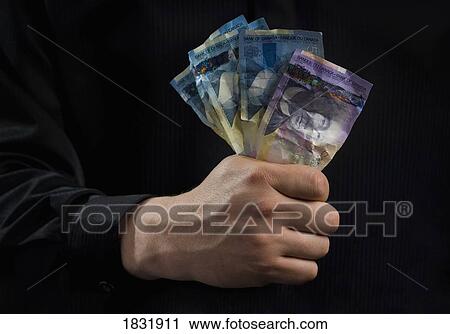 Fist full of money View Large Photo Image Stock Image - Fist full of money. Fotosearch