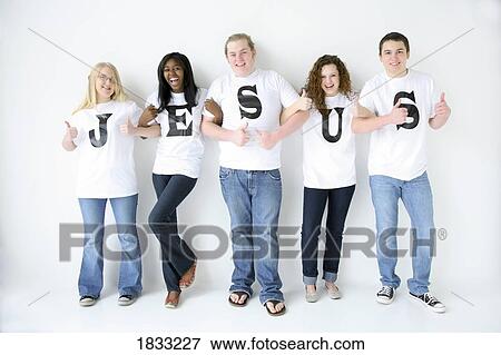 Stock Photo - Five teenagers with t-shirts spelling Jesus. Fotosearch