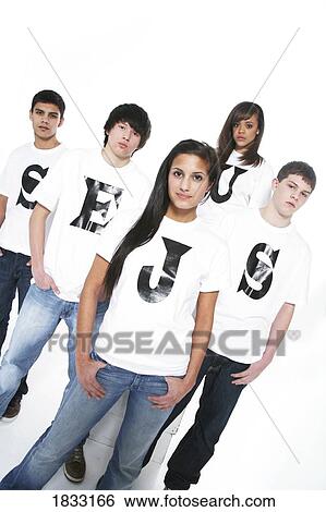 Stock Photograph - Five teenagers with t-shirts spelling Jesus. Fotosearch