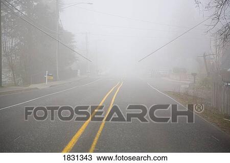 Stock Image - Foggy expanse of road. Fotosearch