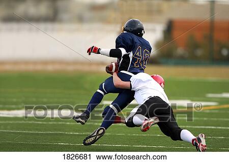 Football tackle View Large Photo Image Stock Image - Football tackle. Fotosearch