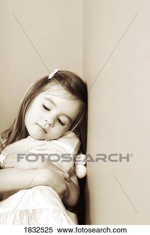 Girl hugging her toy View Large Photo Image Stock Photography - Girl hugging her toy. Fotosearch