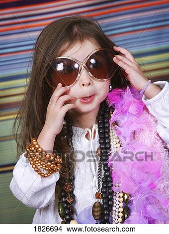 Picture - Girl in dress up clothes. Fotosearch